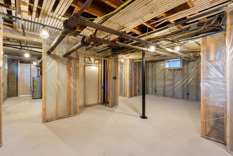 Partially finished basement space - possible bedroom and living room area