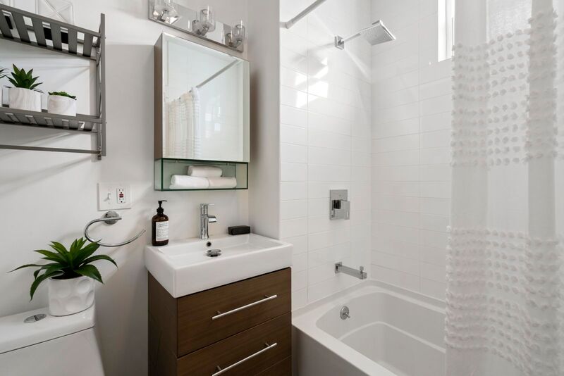 Master bath with full bathtub and shower combination