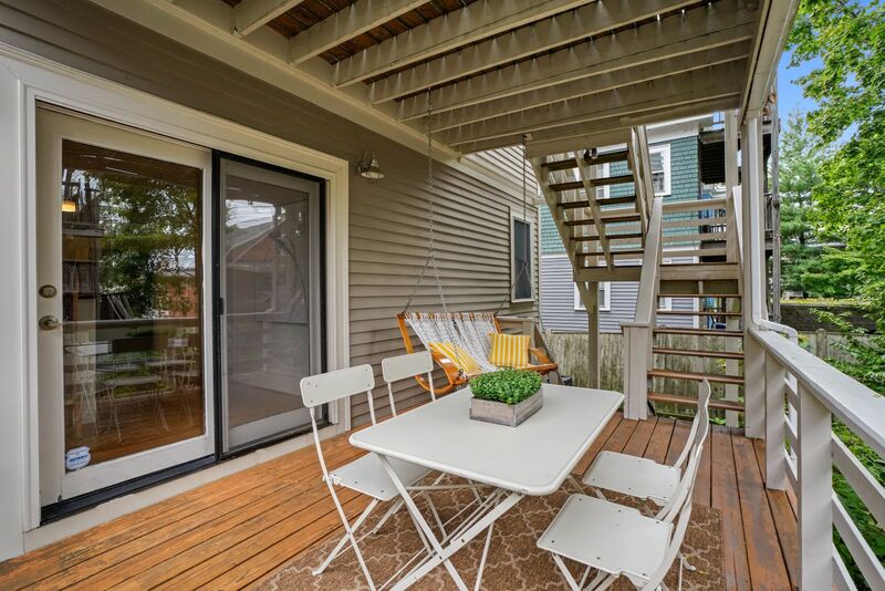 Rear porch with seating area.