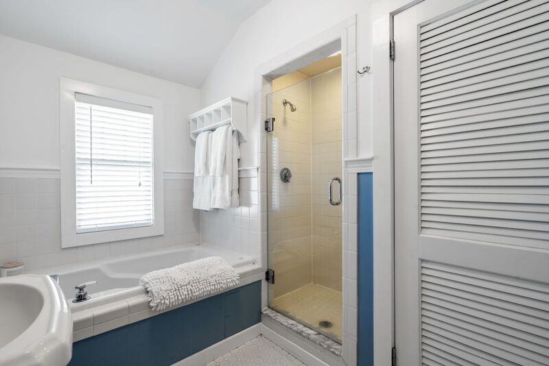 Bathroom with large tub and separate shower