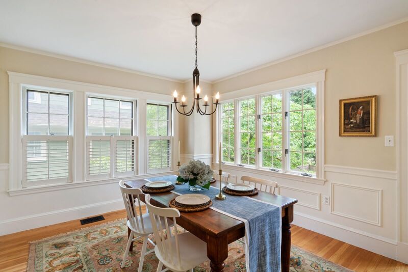 Dining room showing windows covering two walls