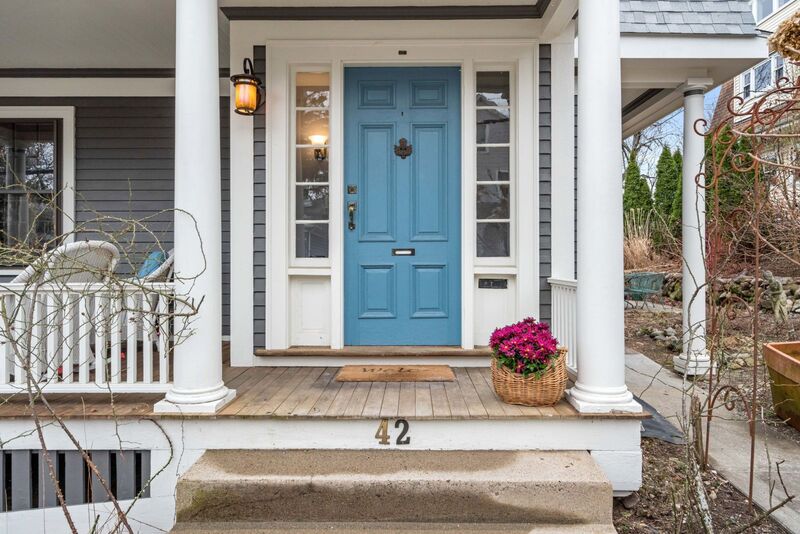 Close up on Blue front door and porch entrance